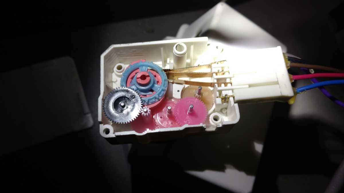 The insides of the defrost timer gearbox